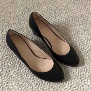 Black leather wedge heels